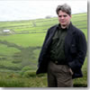 The author stands above the green fields of Ireland's Ring of Kerry