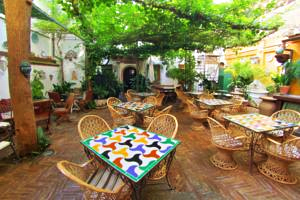 The breakfast patio at the Hotel América, Granada