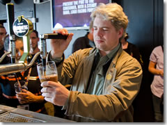 Reid learns to pull a perfect pint at the Guinness Storehouse.