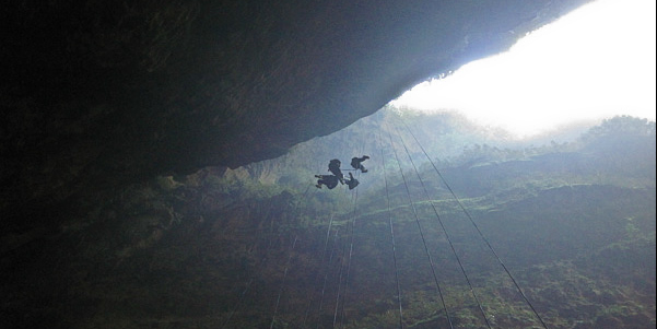 Absailing into the Waitomo caves, New Zealand