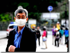 Wearing a mask to ward off air pollution