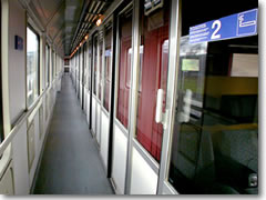 The corridor of a second clas train car in Europe