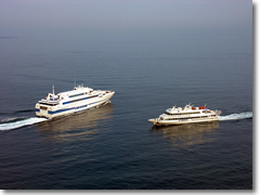A ferry and a hydrofoil in the Bay of Naples