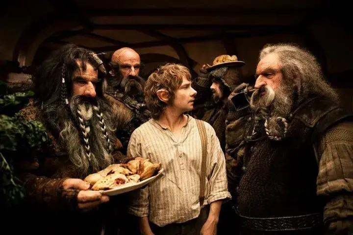 Bilbo and the Dwarves prepare to eat, from "The Hobbit: An Unexpected Journey" (Credit: Warner Bros.)