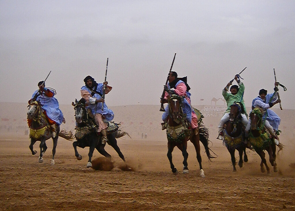 A Berber fantasia charge at the Moussem de Tan Tan