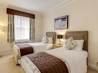 A bedroom in a flat at the Park Lane Apartments in Shaw House